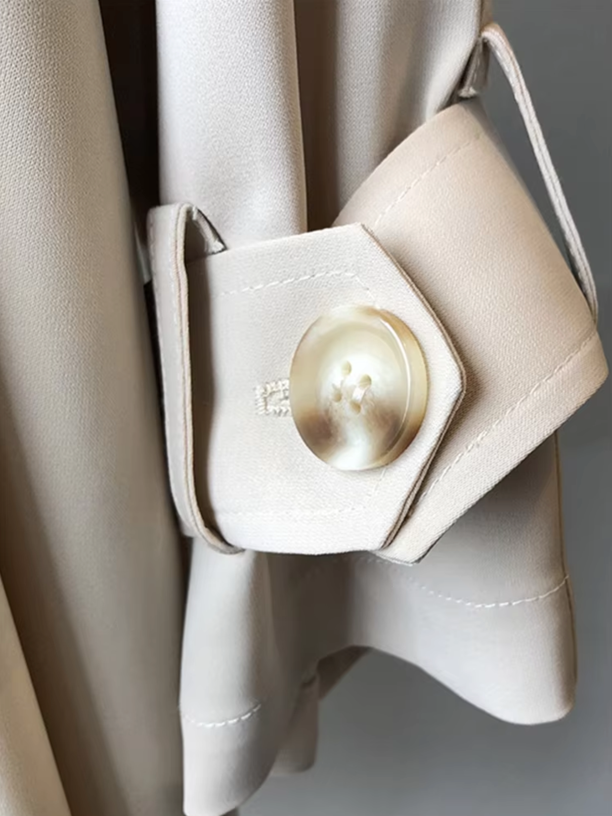 Women's Classic Double-Breasted Waterproof Trench Coat – Detail shot of waterproof fabric texture and coat lining